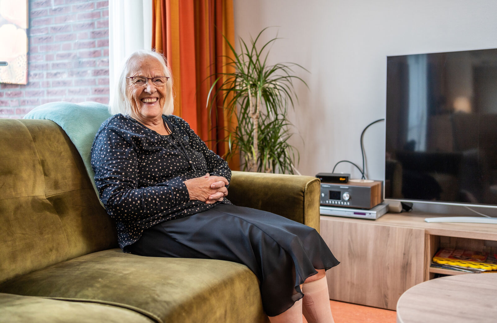 Heukelumshof PG huiskamer met bewoner 1